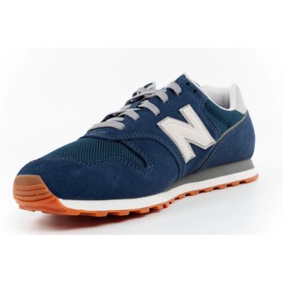 5. New Balance 373 men’s sports shoes, navy leather sneakers