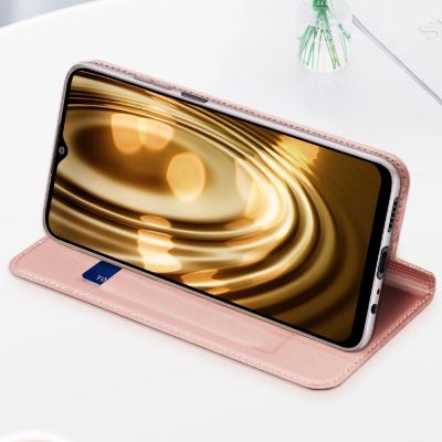 16. Dux Ducis Skin Pro Bookcase type case for Samsung Galaxy A03s golden