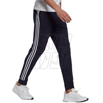 3. Adidas Essentials Fleece Tapered Cuff 3-Band M GK8823 pants