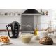 3. Smeg HMF01BLEU hand mixer in a retro 1950s style.