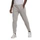 10. adidas Essentials Colorblock Block Cut 3-Stripes Regular Tapered Pants W HB2768