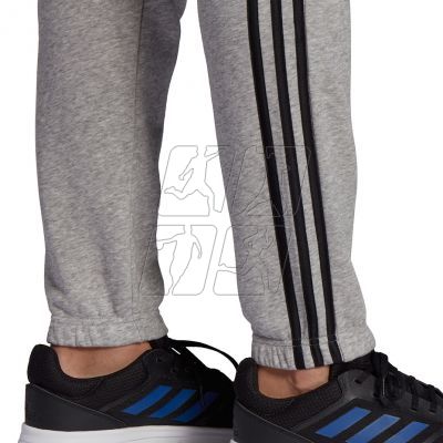 5. Adidas Essentials Tapered Elastic Cuff 3 Stripes Pant M GK9001