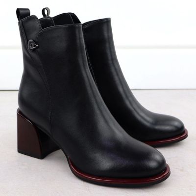 13. Black leather women’s ankle boots with a decorative heel Filippo DBT7363
