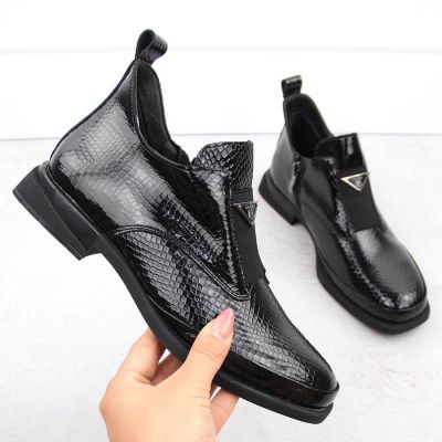 13. Women’s black crocodile-effect patent leather ankle boots with decorative detail, Filippo DBT6425