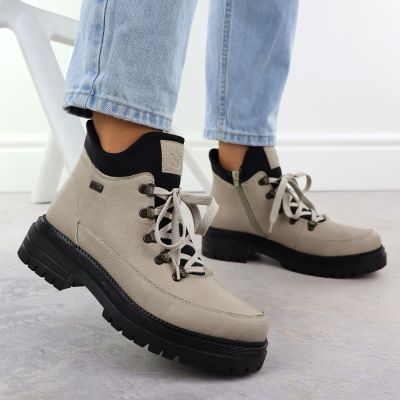 4. Women's beige zippered ankle boots Rieker Y3158-60