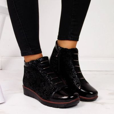 20. Women’s black insulated leather ankle boots with print, Filippo