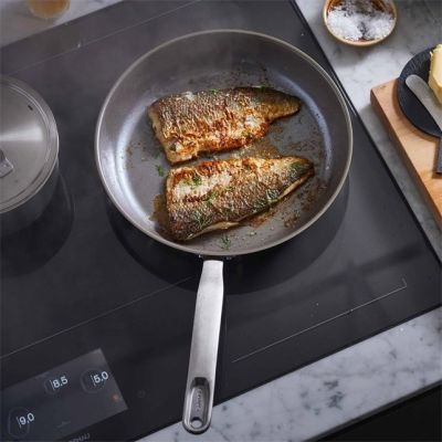 7. Fiskars 1064745 frying pan Universal frying pan Round