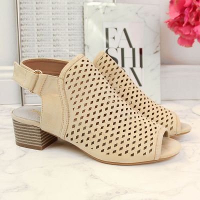 5. Women's beige openwork closed sandals Sabatina