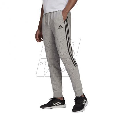 4. Adidas Essentials Tapered Cuff 3 Stripes M GK8976 pants