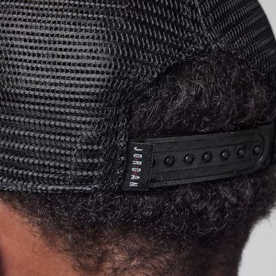 3. Air Jordan Big Kids' Metal Jumpman Trucker Cap - 9A0928-023