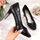 16. Black pumps on the W Sergio Leone post