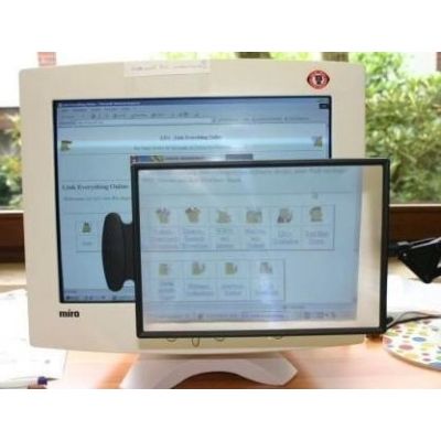 3. Table-top magnifier mounted on a tabletop
