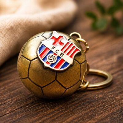 5. FC Barcelona original licensed keychain in the shape of a golden ball with the B7081 coat of arms