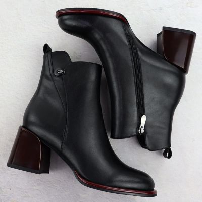 14. Black leather women’s ankle boots with a decorative heel Filippo DBT7363