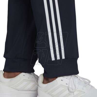 6. Adidas Essentials Tapered Cuff 3 Stripes Pants M GK8981