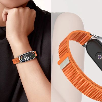 3. Tech-Protect Nylon Pro Strap for Xiaomi Smart Band 8/9/10/NFC - Black and Orange