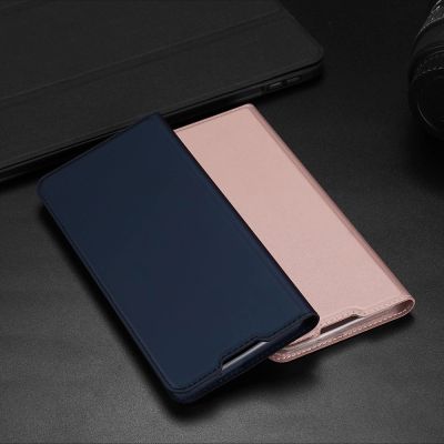 19. Dux Ducis Skin Pro Bookcase type case for Samsung Galaxy A03s golden