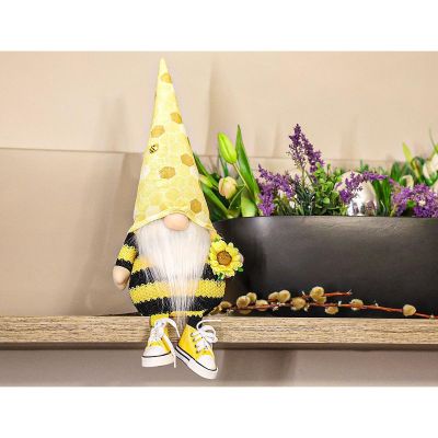 7. SNOW gnome sitting drone 35+6cm in sneakers spring decoration