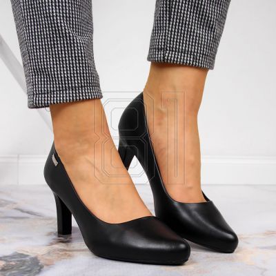 14. Black pumps on the W Sergio Leone post