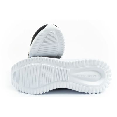 9. Calvin Klein women's shoes sports sneakers Eva Runner black fashionable