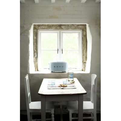 7. Smeg TSF02PBEU Toaster 4 Slices 1500W Blue