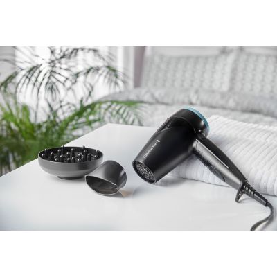 5. REMINGTON Compact On The Go D1500 Hair Dryer (2000W; Black)
