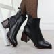 5. Black leather women’s ankle boots with a decorative heel Filippo DBT7363