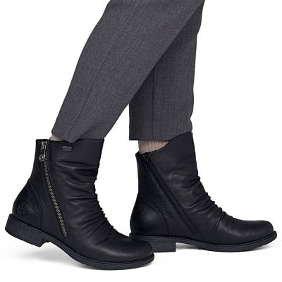 6. Rieker 74853-00 Waterproof Black Leather Ankle Boots for Women