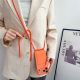 5. iPhone 17 Pro / 18 Pro Silicone Case with Card Pocket and Crossbody Strap - Orange