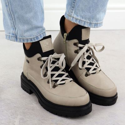 5. Women's beige zippered ankle boots Rieker Y3158-60