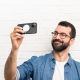 4. Dux Ducis Grit Leather Case for iPhone 14 Plus Elegant Faux Leather Cover (MagSafe Compatible) Black