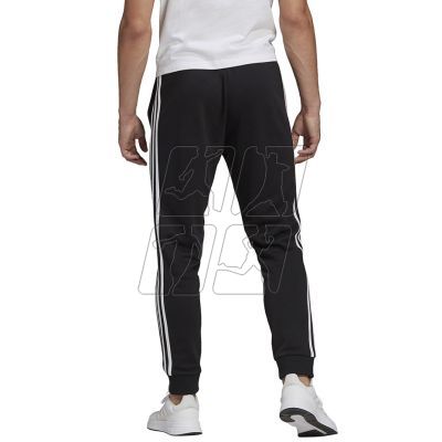 8. Adidas Essentials Tapered Cuff 3 Stripes M GK8831