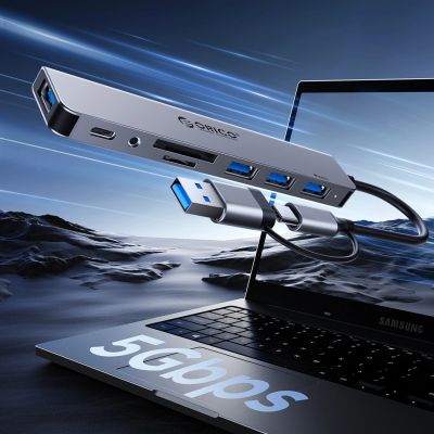 5. Orico YSB4-U2 USB-A/USB-C Hub Docking Station 2x USB-A 2.0 + 1x USB-A 3.0 + 1x USB-C 2.0 + 1x USB-C - Gray
