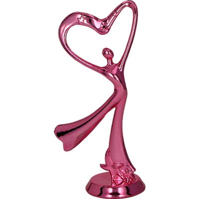 3. Pink plastic figurine - dancing