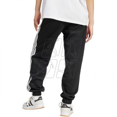 7. adidas Essentials 3-Stripes Fleece Loose-Fit Pants W JE1276