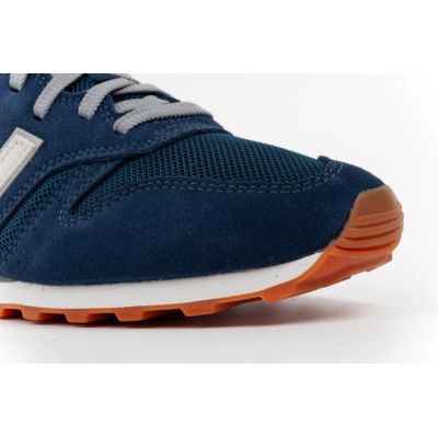 10. New Balance 373 men’s sports shoes, navy leather sneakers