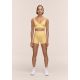 3. CASALL Ultra High Waist Hot Pant Women's Training Leggings Yellow
