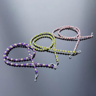 4. A chain for glasses, beads, an orange pendant