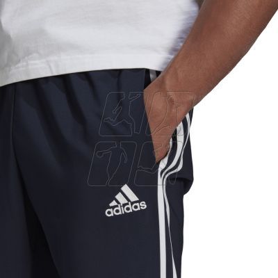 5. Adidas Essentials Tapered Cuff 3 Stripes Pants M GK8981