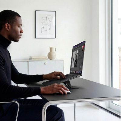 14. Spigen SlimFold LD201-S6 Laptop Stand - Gray
