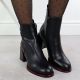12. Black leather women’s ankle boots with a decorative heel Filippo DBT7363