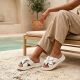 7. Women's leather flip-flops with a flower, white Filippo DK7762