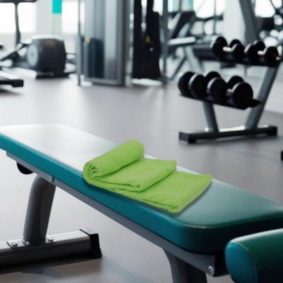 3. QUICK-DRYING SPORTS TOWEL WITH STORAGE BAG 80X40CM DUNLOP GREEN