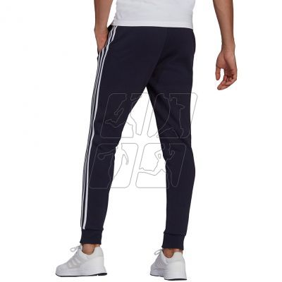 4. Adidas Essentials Fleece Tapered Cuff 3-Band M GK8823 pants