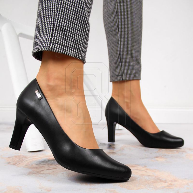 8. Black pumps on the W Sergio Leone post