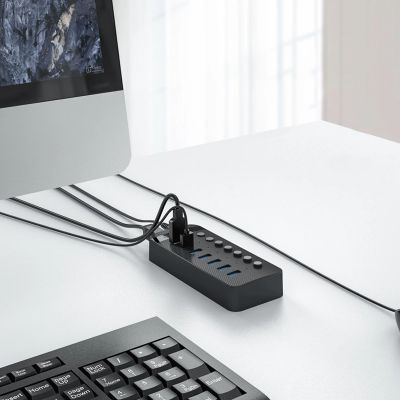 4. Orico CT2U3-7AB 7x USB-A 3.0 Hub with Switches - Black