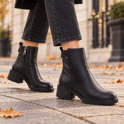 5. Women’s black leather block-heel ankle boots Vinceza 67033