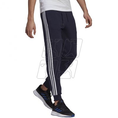 3. Adidas Essentials Slim 3 Stripes Pants M GM1090