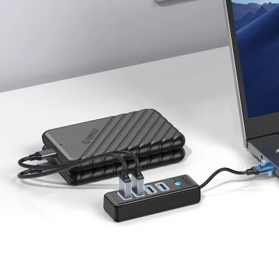 4. Orico PW4U-C3 USB-C / 4x USB-A 3.0 Hub - Black