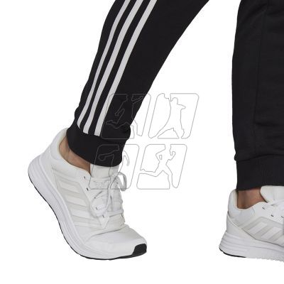 10. Adidas Essentials Tapered Cuff 3 Stripes M GK8831